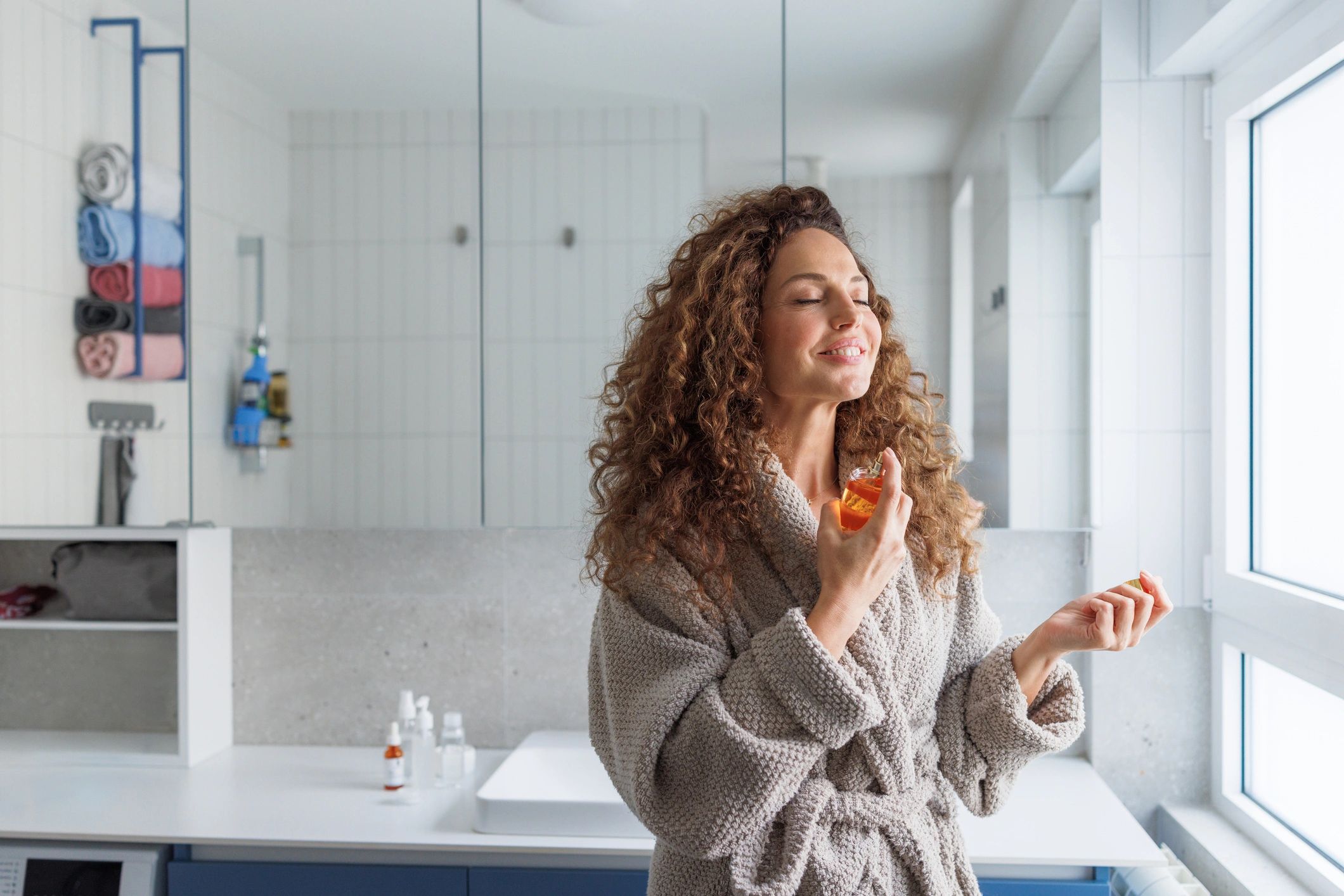 Woman in a calm self-care setting representing renewed energy and wellness